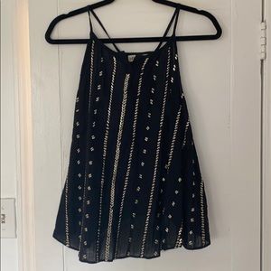 Black shirt with gold beads